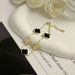 Radiant Four Petals Gold Toned Bracelet in Black