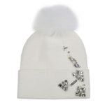 Elegant Pompom Hat with Sparkling Jewels in Cream