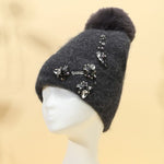 Elegant Pompom Hat with Sparkling Jewels