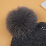 Elegant Pompom Hat with Sparkling Jewels