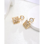 Pearl and Crystal Dangle Earrings in Gold