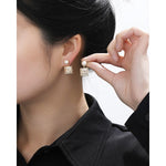 Pearl and Crystal Dangle Earrings in Gold