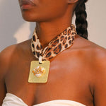 Leopard Print Necklace with Bold Gold Tone Medallion