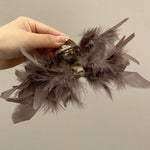 Feathers hair claw with silk ribbon