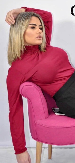 Ruffle polo neck